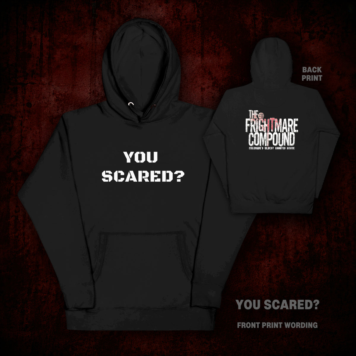 Black pullover hoodie shown from the front and back on a dark red textured background. The front reads 'YOU SCARED?' in white block letters, and the back reads 'THE FRIGHTWARE COMPOUND' with smaller text below.
